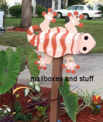 Gecko mailbox painted in house colors